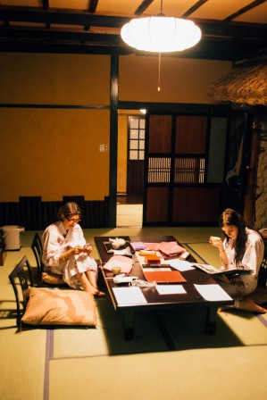 Western lady and her daughter sat in a traditional japanese room