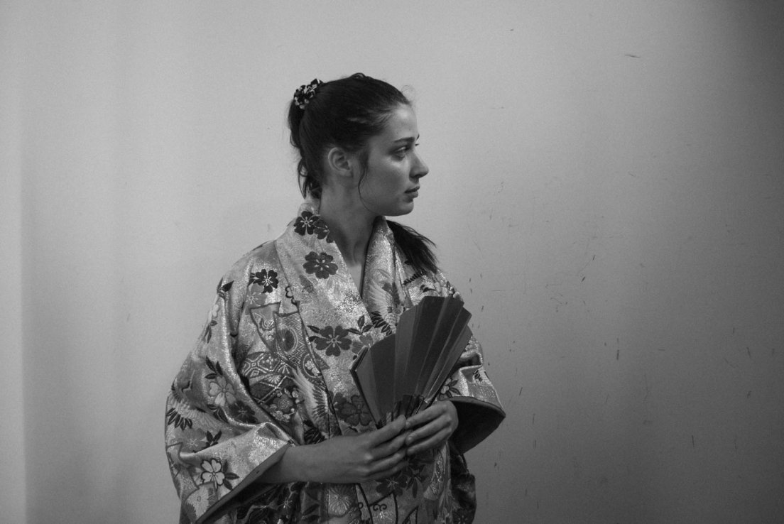 A western girl trying out a gold-embroidered kimono