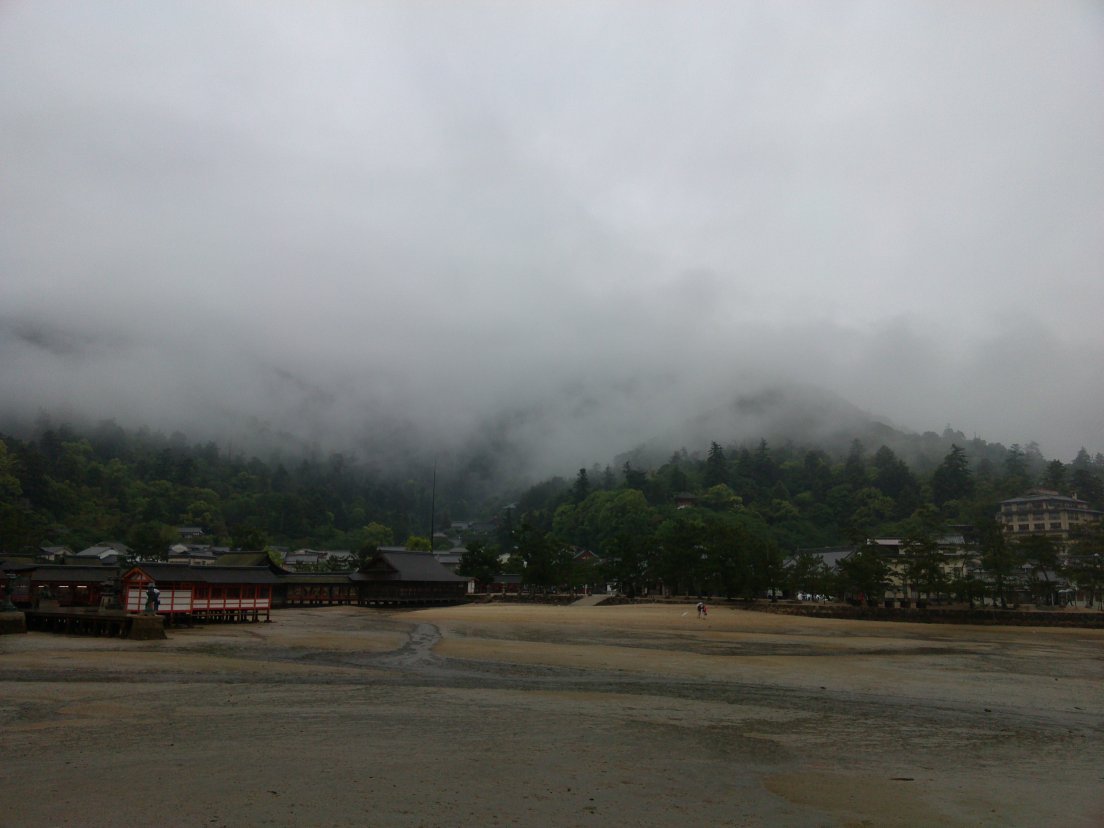 Low tide and cloudy hills