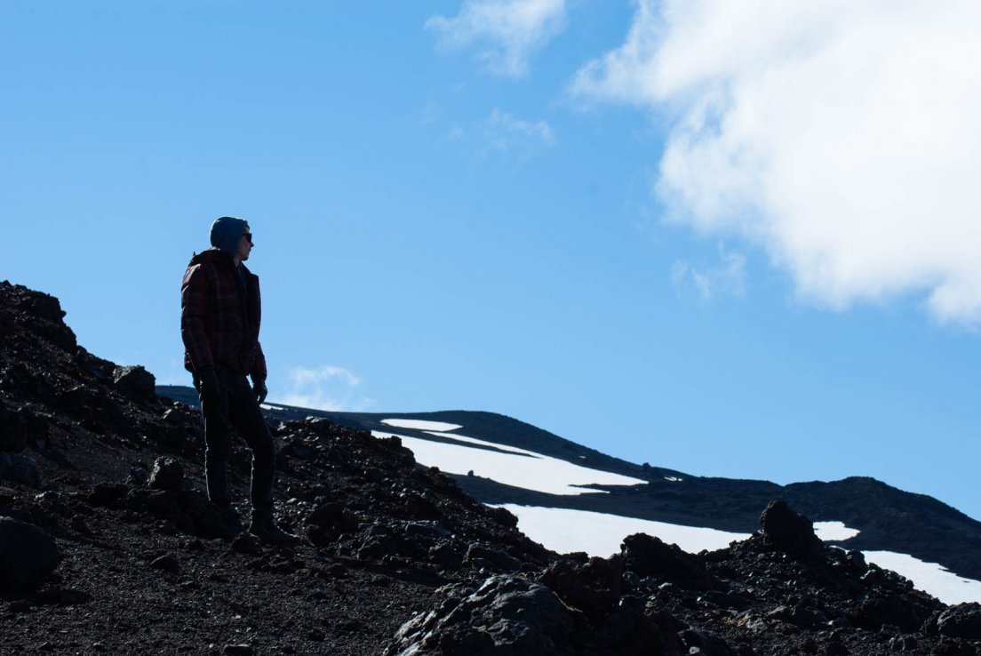 Young man standing up in the lava