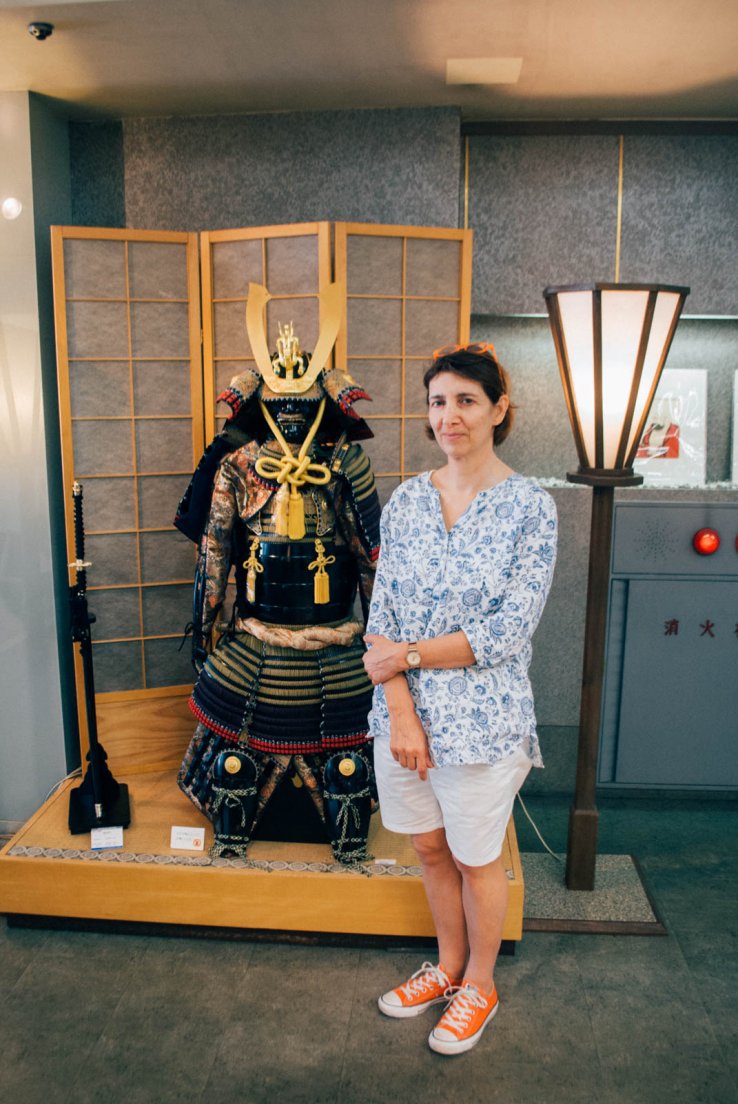 Western lady posing with a samourai costume