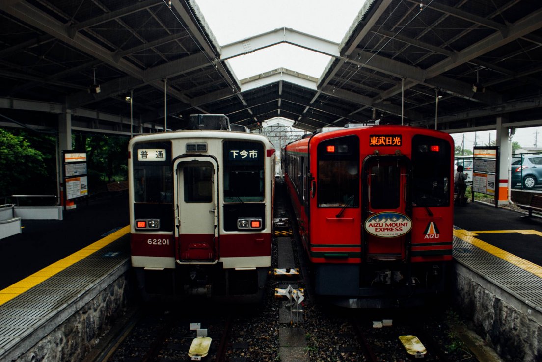 Two wagons side by side at Nikkō station