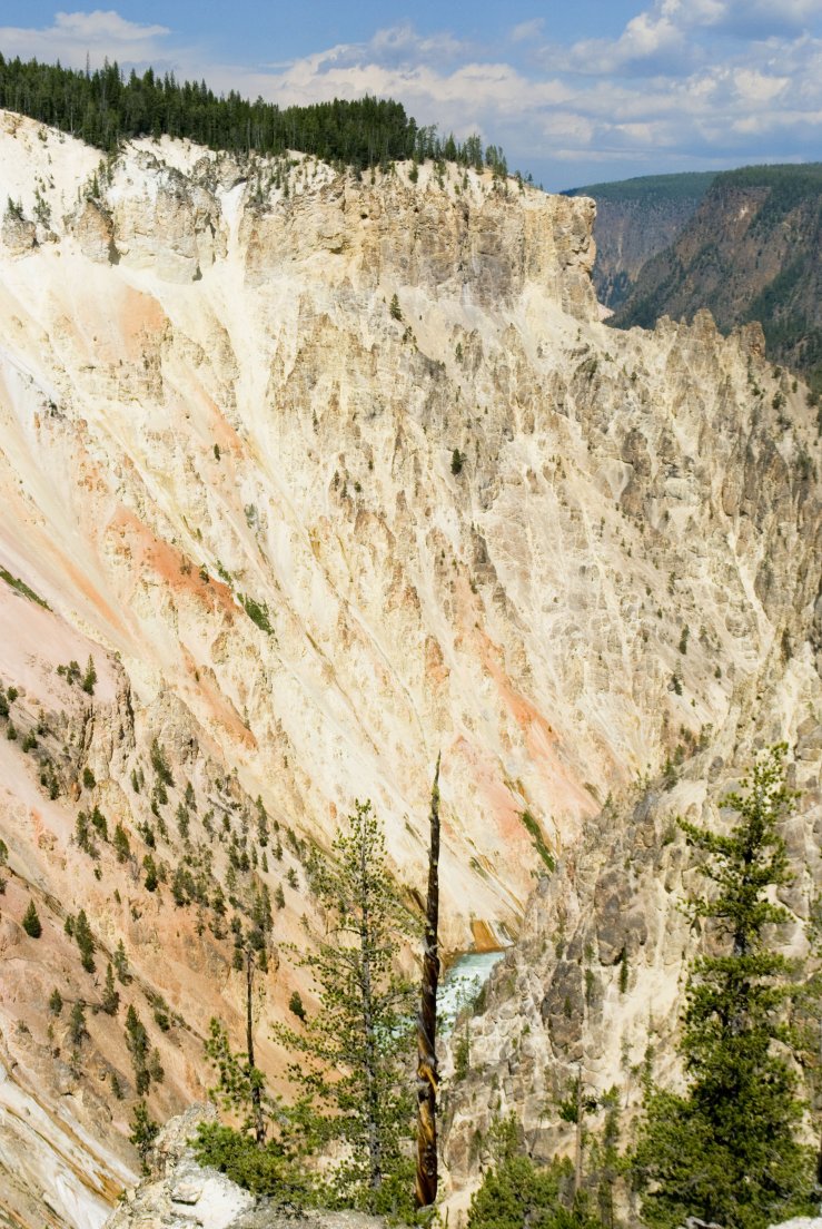 A yellow and pink canyon on a sunny day