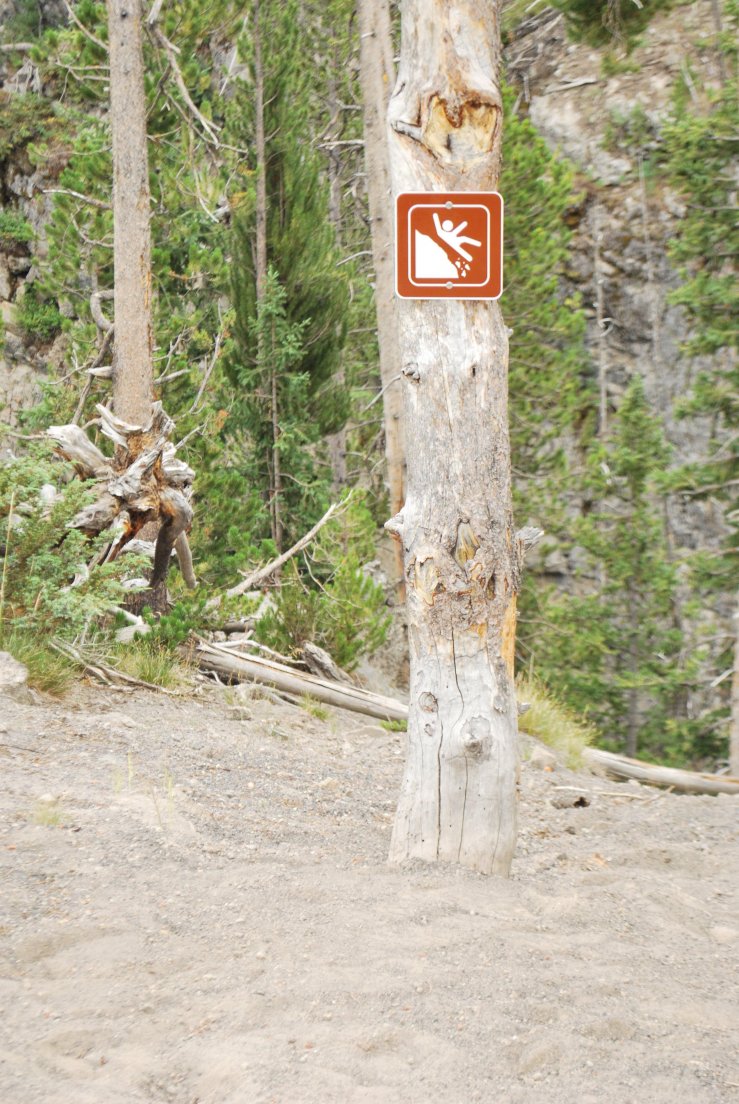 Sign to prevent falling off from the cliff