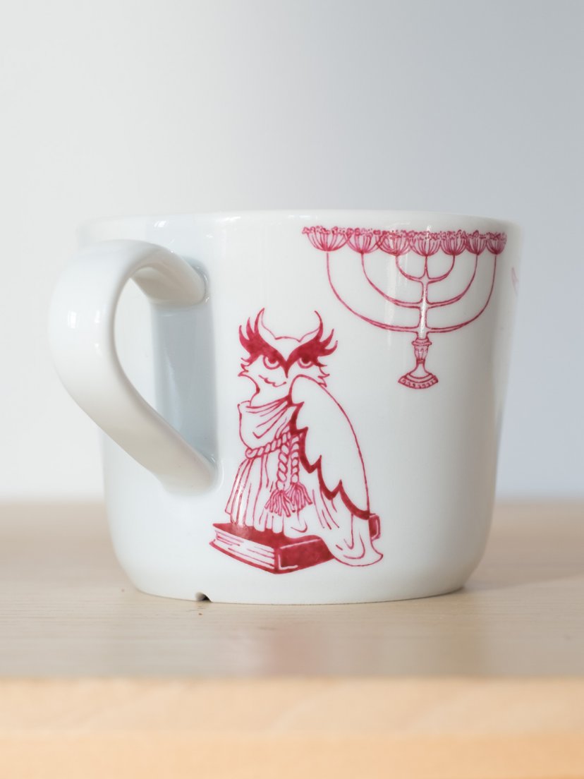 Testing drawings on a cardinal red teacup for Enchanteresse, a collection of hand-painted porcelains by messalyn
