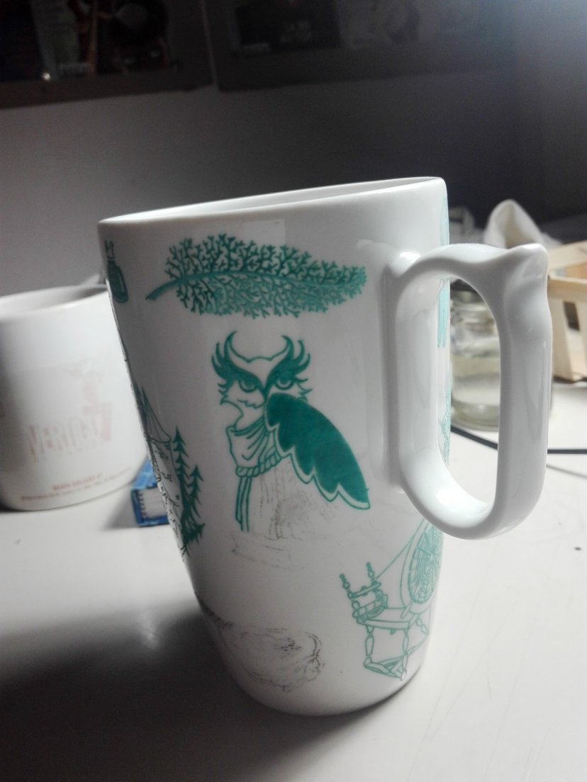 Work in progress on a seafoam mug from Enchanteresse, a hand-painted porcelain collection by messalyn